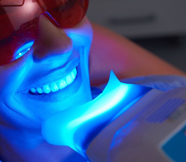 patient getting teeth whitening treatment
