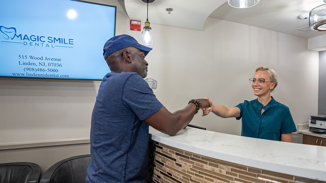 patient meeting a staff member in a dental office