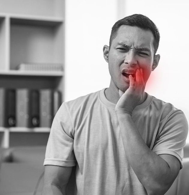 person with toothache