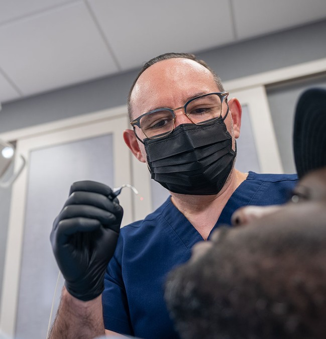 doctor treating a patient