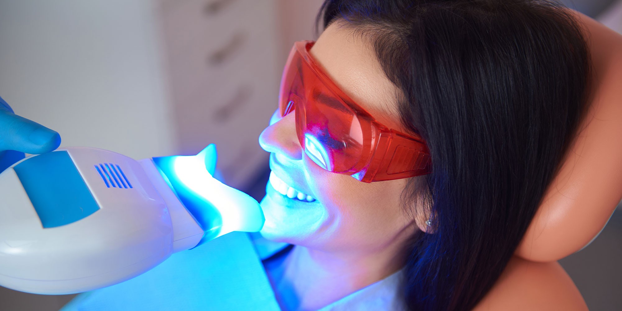 person getting teeth whitening treatment