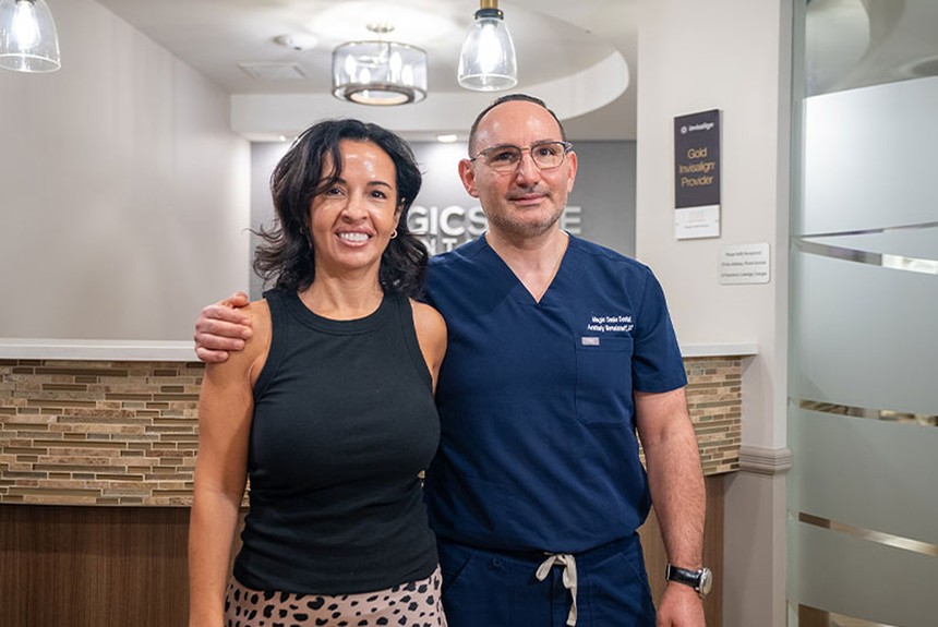 doctor standing with a patient