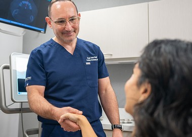 doctor shaking hands with a patient